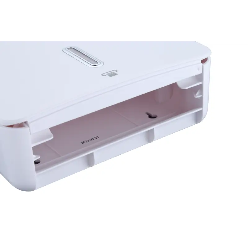 Dolphy Jumbo Ultraslim paper towel dispenser open view showing M-fold paper towel loading in white finish